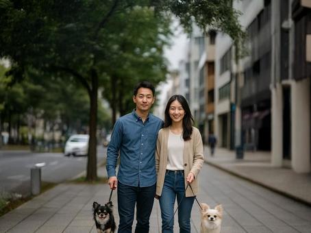 犬の散歩する夫婦 犬の散歩する夫婦の写真