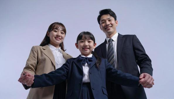 仲良しの制服の子供と両親のポートレート 仲良しの制服の子供と両親のポートレートの写真