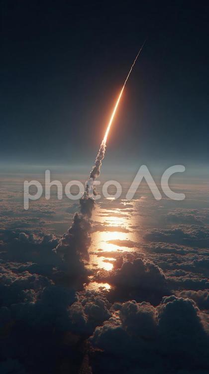 飛翔するロケットと、地球の壮大な景色 ロケット,ミサイル,打ち上げの写真素材