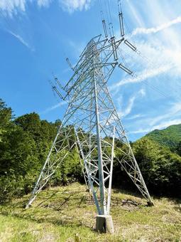鉄塔と木々と青空 鉄塔と木々と青空の写真