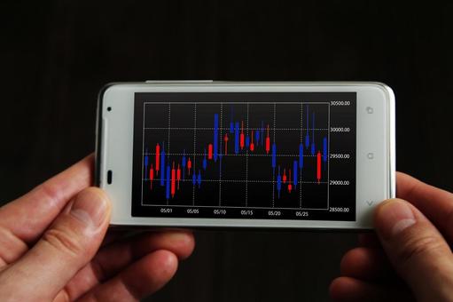 スマホで見る株価チャート スマホで見る株価チャート スマートフォン,株価,チャートの写真素材