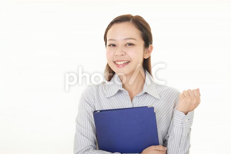 ガッツポーズのビジネスウーマン 女性,ビジネスウーマン,仕事の写真素材