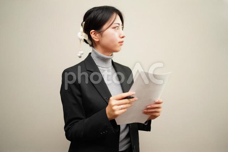 スーツ姿のビジネス女性イメージ 20代,屋内,女性の写真素材