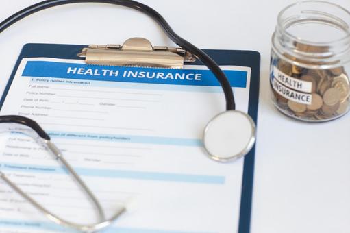 医療保険の確認書、聴診器 保険業,医療機関,金融業の写真素材
