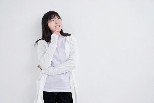 Junior high school girls thinking about ideas on a white background, JPG Junior high school girls thinking about ideas on a white background, JPG
