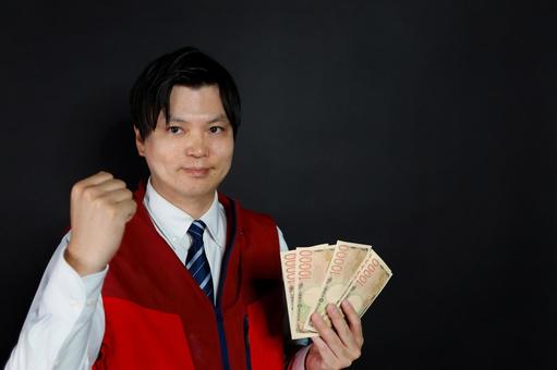 お金に喜ぶ男性 お金に喜ぶ男性 男性,お金,千円札の写真素材