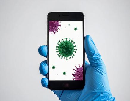 ウィルスに感染したスマホ ウィルスに感染したスマホの写真