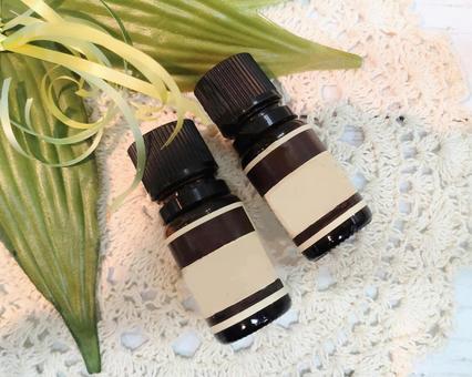 自作イランイランとラベル付き精油ボトル アロマオイル,アロマ,ボトルの写真素材