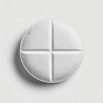 質感のある白い円形の錠剤の写真