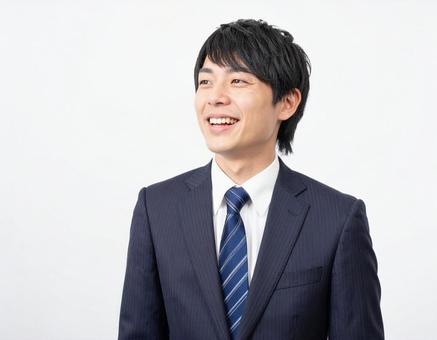 笑うビジネスマン 笑うビジネスマンの写真