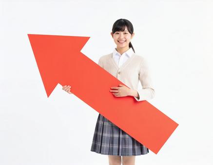 Image of a female student holding an arrow pointing up, arrow, female, girls student, JPG