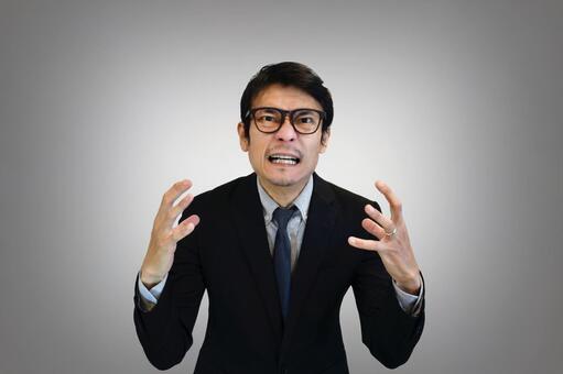 怒っている様子の男性 怒り,怒る,悔しいの写真素材