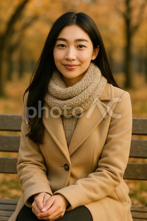 公園でくつろぐ女性のポートレート（秋） 秋,公園,ベンチの写真素材