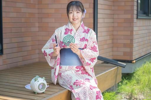 蚊取り線香と浴衣女性 浴衣,女性,笑顔の写真素材
