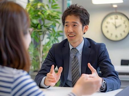 A businessman enthusiastically explaining to a customer, male, staff, female, JPG