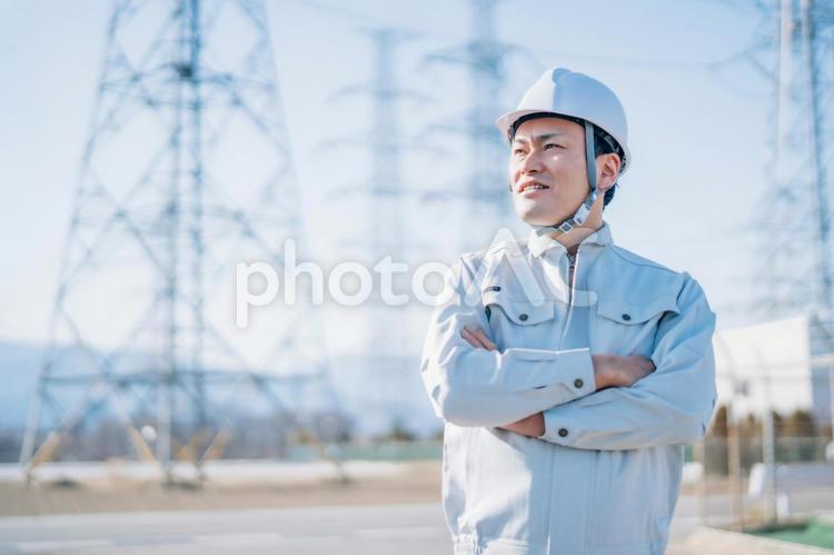 電気工事士・電力会社・作業着を着た男性 電力会社,電気工事士,作業員の写真素材