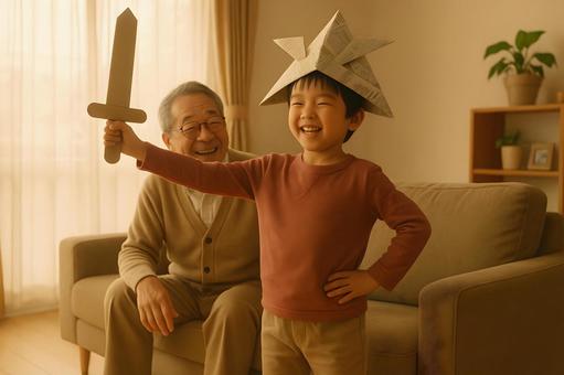 紙兜で遊ぶ孫と祖父の写真