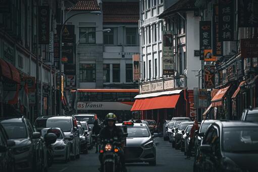 繁華街の賑やかな通り 繁華街,車,バイクの写真素材