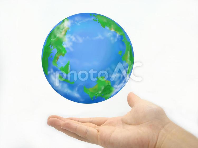 手のひらの上に浮かぶ地球 手のひら,地球,エコの写真素材