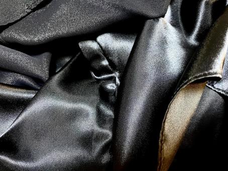 艶々の黒いサテン布素材 艶々の黒いサテン布素材の写真
