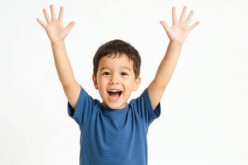 子供の両手を上げて万歳する笑顔・キッズ 子供の両手を上げて万歳する笑顔・キッズの写真