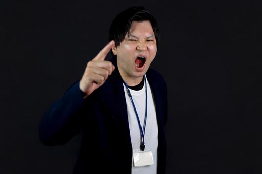 怒って指差す男性 怒って指差す男性 男性,怒り,指差すの写真素材