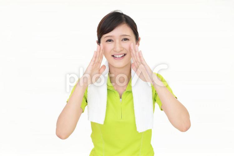 応援するスポーツウェアを着ている女性 女性,健康,運動の写真素材