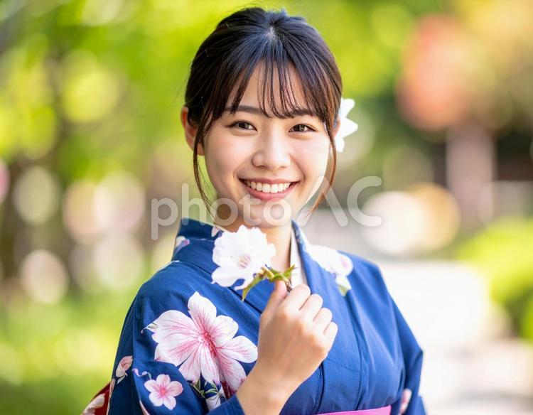 8月の誕生花トルコキキョウと、浴衣の彼女 8月,誕生花,トルコキキョウの写真素材