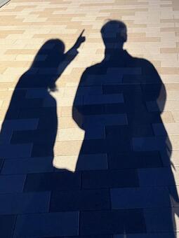 頭上を指さす影 影,シルエット,指の写真素材