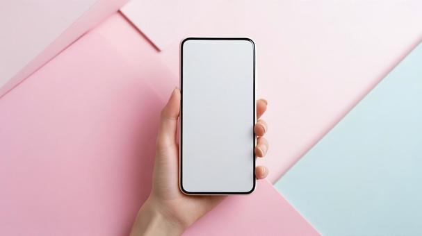 カラフルな背景にスマホを持つ女性の手5の写真