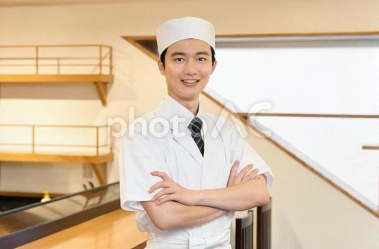 店内で腕組みをする和食の料理人 料理人,調理師,和食の写真素材