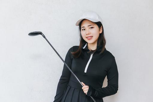ゴルフする女性 ゴルフする女性 ゴルフ,スポーツ,ゴルフスポーツの写真素材