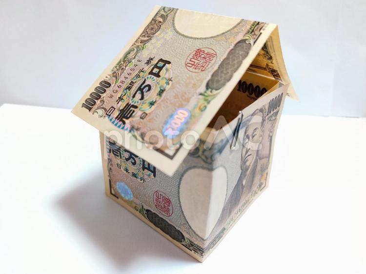 万札　家の形 お金,一万円札,福沢諭吉の写真素材