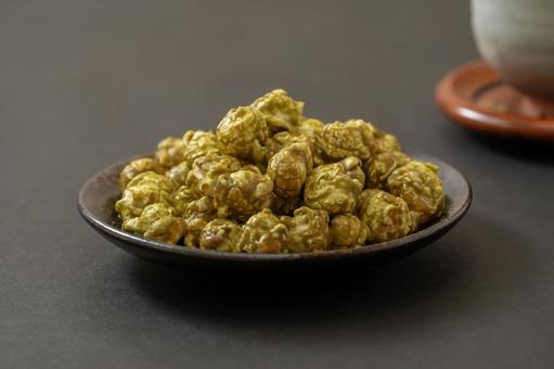 Matcha popcorn on a simple black background, JPG