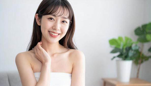自宅でお化粧をする女性 自宅でお化粧をする女性の写真