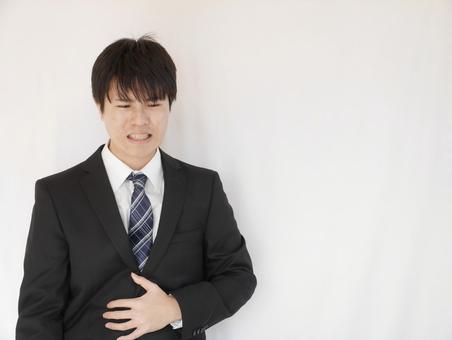 20's man businessman stomachache 20's man businessman stomachache