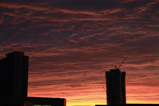 夕陽 夕陽 夕焼け,ビル,建設中の写真素材