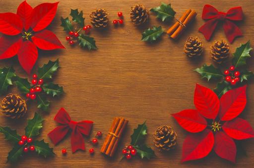 ポインセチアと木目背景 明るめ ポインセチアと木目背景 明るめの写真