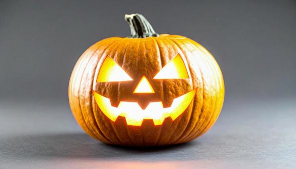 暗闇に光るジャック・オー・ランタンの写真