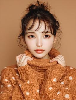 バンビ柄のネックセーターをを着た女性の写真