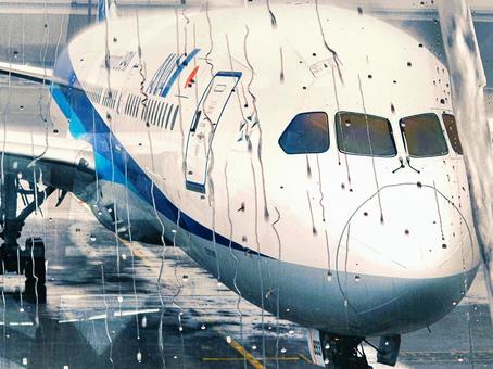 雨の中の飛行機 空港,飛行機,旅行の写真素材