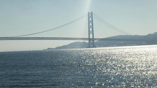 大蔵海岸から見た明石海峡大橋と淡路島 海,神戸市垂水区,大蔵海岸の写真素材