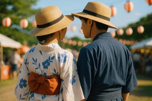 日よけ帽子のカップル 日よけ帽子のカップルの写真