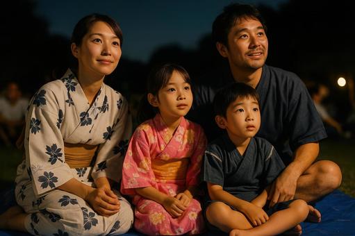 花火前に待機する日本人家族 花火前に待機する日本人家族の写真