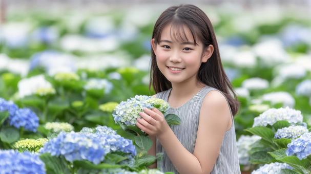 アジサイとワンピースを着た少女 アジサイとワンピースを着た少女の写真