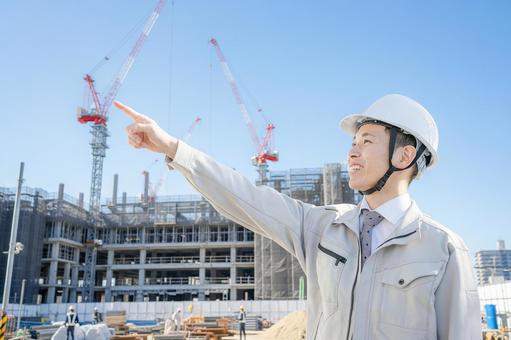 指差す作業員 指差す作業員 建設,建築,現場監督の写真素材
