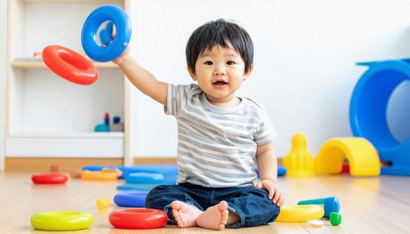 輪投げで遊ぶ園児 輪投げで遊ぶ園児の写真