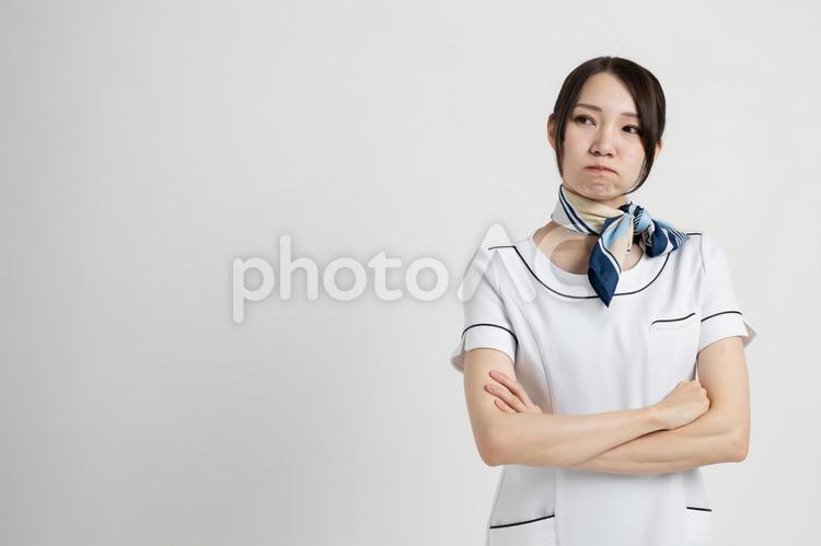 腕を組み怒るエステティシャン エステ,エステティシャン,女性の写真素材