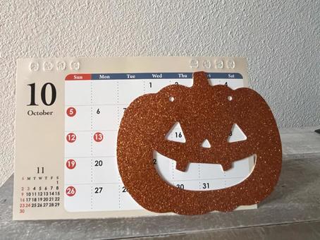 ハロウィン。カボチャとカレンダー 10月,カレンダー,ジャックオランタンの写真素材