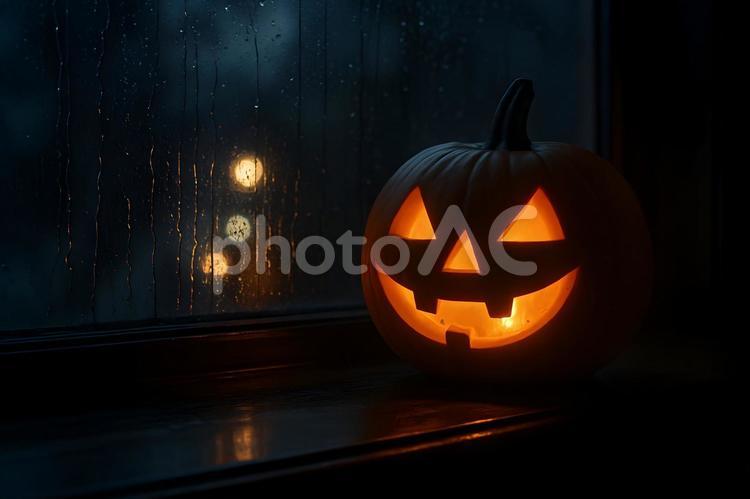 雨夜の窓辺と笑顔の南瓜 ハロウィン,ジャックオーランタン,窓辺の写真素材